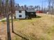 Exterior view of a charming two-story home with a front porch at 118 Raven Rd, Villa Rica, GA 30180