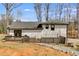 View of the back exterior with a deck and access to the backyard at 118 Raven Rd, Villa Rica, GA 30180