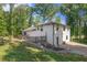The exterior shows a two-story home with a deck and a spacious yard, offering a blend of comfort and outdoor enjoyment at 118 Raven Rd, Villa Rica, GA 30180
