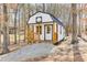 A charming outbuilding with a small porch at 118 Raven Rd, Villa Rica, GA 30180