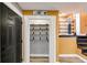 Well-organized pantry with shelving and stylish wallpaper, adjacent to the kitchen area at 118 Raven Rd, Villa Rica, GA 30180