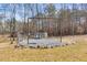 Open yard features a swing set surrounded by a rock border at 118 Raven Rd, Villa Rica, GA 30180