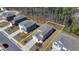 An aerial shot showing a home with a brick-accented facade and driveway at 1659 Hay Patch Ln, Loganville, GA 30052