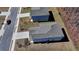 Bird's eye view of roof, landscaping, driveway, and surrounding neighborhood at 1659 Hay Patch Ln, Loganville, GA 30052