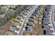 An aerial view of the homes, road, and surrounding trees at 1659 Hay Patch Ln, Loganville, GA 30052