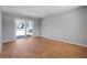 Bright bedroom featuring neutral walls, wood floors, and a sliding glass door to the outside at 2522 Brentwood Ct, Decatur, GA 30032