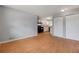 Open living room featuring neutral paint, wood floors, and an open floor plan at 2522 Brentwood Ct, Decatur, GA 30032