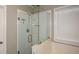 Bathroom featuring glass shower with white tile at 3820 Mast Nw Ct, Kennesaw, GA 30144