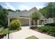 Charming clubhouse with a welcoming porch and well-manicured landscaping in Legacy Park at 3820 Mast Nw Ct, Kennesaw, GA 30144