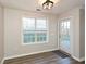 Comfortable dining area featuring vinyl flooring and a backyard view from a nearby window at 3820 Mast Nw Ct, Kennesaw, GA 30144