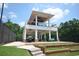 Community pavilion with outdoor seating, a barbecue grill, and gathering spaces in Legacy Park at 3820 Mast Nw Ct, Kennesaw, GA 30144