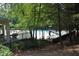 Legacy Park's community pool and lounging area with lush green trees at 3820 Mast Nw Ct, Kennesaw, GA 30144