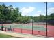Legacy Park's well-maintained, fenced in tennis courts at 3820 Mast Nw Ct, Kennesaw, GA 30144