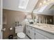 Full bathroom with a skylight, toilet, and vanity at 4053 Thompson Mill Rd, Buford, GA 30519