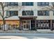 Attractive building entrance with glass doors, planters, and ample natural light at 878 Peachtree # 522, Atlanta, GA 30309