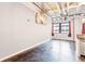 Modern living space with concrete floors, exposed ceiling, and large windows at 878 Peachtree # 522, Atlanta, GA 30309