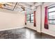Bright, spacious living room featuring exposed ductwork, large windows, and ample natural light at 878 Peachtree # 522, Atlanta, GA 30309