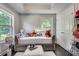 Bedroom with day bed, fur rug, and large windows at 1007 Belle Ave, Roswell, GA 30076