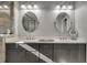 A main bathroom with dual sinks and a large mirror above each at 1007 Belle Ave, Roswell, GA 30076