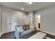 Cozy room with comfortable sofa and access to doors for private relaxation at 1007 Belle Ave, Roswell, GA 30076