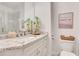 Elegant bathroom vanity with granite countertop and decorative floral accents at 3123 Neal Ct, Cumming, GA 30041
