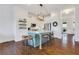 Bright kitchen with a large island, seating, modern appliances, and open space ideal for meal preparation and gatherings at 3123 Neal Ct, Cumming, GA 30041