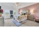 Cozy main bedroom with plush carpeting, decorative bedding and views to the neighborhood at 3123 Neal Ct, Cumming, GA 30041