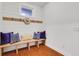 Mudroom featuring a custom bench with storage underneath and convenient hooks at 3123 Neal Ct, Cumming, GA 30041