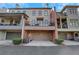 Townhouse boasting multiple balconies with a large garage at 3123 Neal Ct, Cumming, GA 30041