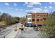 Charming brick building with awnings, street parking, and outdoor seating areas at 1430 Dresden Ne Dr # 200, Atlanta, GA 30319