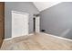 Cozy bedroom with carpeting, double closet, and gray walls at 170 Double D Rd, Temple, GA 30179
