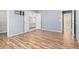Spacious main bedroom with wood floors, ensuite bathroom, and walk-in closet at 170 Double D Rd, Temple, GA 30179