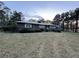 Brick home with lawn and partial lake view at 2443 Highway 92 S, Fayetteville, GA 30215