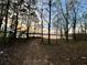 Tree-lined path leading to the lake at 2443 Highway 92 S, Fayetteville, GA 30215