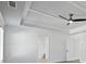 A bright bedroom featuring a trey ceiling with ceiling fan and shiplap walls at 4190 Hosch Reserve Dr, Buford, GA 30519