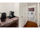 Hallway features a coffee bar and wine storage nook that leads to the laundry room at 4635 High Point Rd, Atlanta, GA 30342