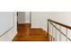 Hallway features wood flooring and a staircase at 4635 High Point Rd, Atlanta, GA 30342