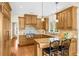 Well-equipped kitchen features a central island, custom cabinets, and a window over the sink at 4635 High Point Rd, Atlanta, GA 30342