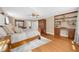 Bright and airy main bedroom with hardwood floors, large windows, and elegant decor, creating a relaxing retreat at 4635 High Point Rd, Atlanta, GA 30342