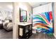 Modern bathroom with colorful shower curtain, contemporary vanity, and stylish fixtures at 570 Glengate Cv, Atlanta, GA 30328