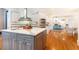 Open-concept kitchen with a center island, granite countertops, and stainless steel appliances at 570 Glengate Cv, Atlanta, GA 30328