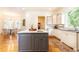Spacious kitchen with a large center island, modern appliances, and ample counter space at 570 Glengate Cv, Atlanta, GA 30328
