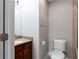 Bathroom features a single sink vanity, toilet, and tiled shower at 7 Villa Se Ct, Smyrna, GA 30080