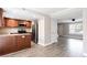 Stylish kitchen with granite counters, stainless appliances and laminate flooring at 7 Villa Se Ct, Smyrna, GA 30080