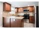 Modern kitchen boasts granite countertops and stainless steel appliances at 7 Villa Se Ct, Smyrna, GA 30080
