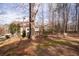 Backyard seating area with trees in the background at 706 Registry Run, Kennesaw, GA 30152