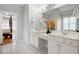 Bathroom with double sink vanity and large mirror at 706 Registry Run, Kennesaw, GA 30152
