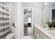 Bathroom with dual sinks, and a shower-tub combo at 706 Registry Run, Kennesaw, GA 30152