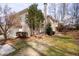Exterior view of home highlighting a garage and an inviting backyard patio at 706 Registry Run, Kennesaw, GA 30152