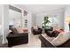 Bright, airy living room with neutral décor, comfortable seating, and large windows at 706 Registry Run, Kennesaw, GA 30152